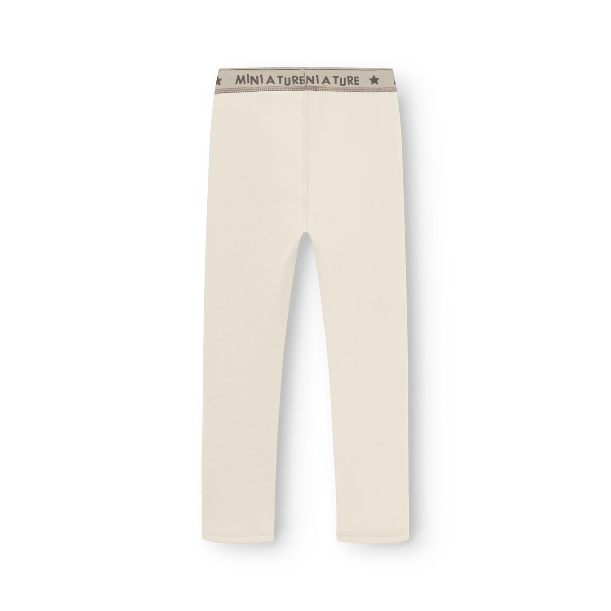 MATLEEMA let fleecetights til børn i lys cremefarve, fotograferet bagfra på hvid baggrund med gråbrun elastisk linning med MINI A TURE-logo og stjerner.