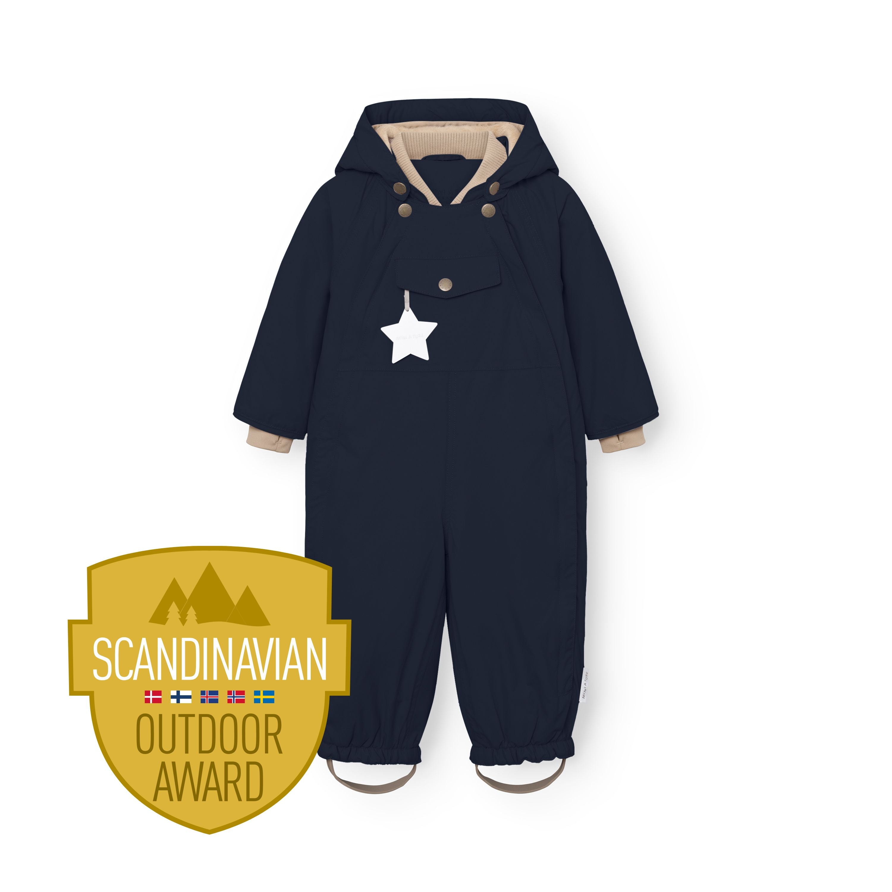 MATWISTI fleeceforet flyverdragt i mørk marineblå, fotograferet forfra på hvid baggrund med hætten oppe og en hvid stjernerefleks, der hænger fra brystlommen. Billedet er prydet med et Scandinavian Outdoor Award-badge, og de beige fodstropper ved anklerne samt den beige ribkant i halsen er tydeligt synlige.